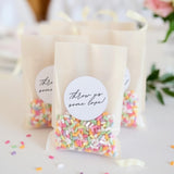 Round wedding confetti bag stickers with ‘Toss for the Newlyweds’ text – minimalist wedding favor labels for confetti packets