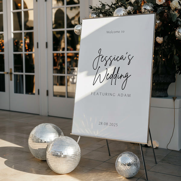 Bride's wedding featuring groom wedding welcome sign personalised - sophisticated black text "a forever kinda thing" with custom name and date, on a simple white background, giving that timeless, chic wedding aesthetic.