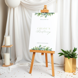 Personalised Christening Welcome Sign – A beautifully designed welcome sign featuring the baby’s name and event details, displayed on an easel at a christening venue.