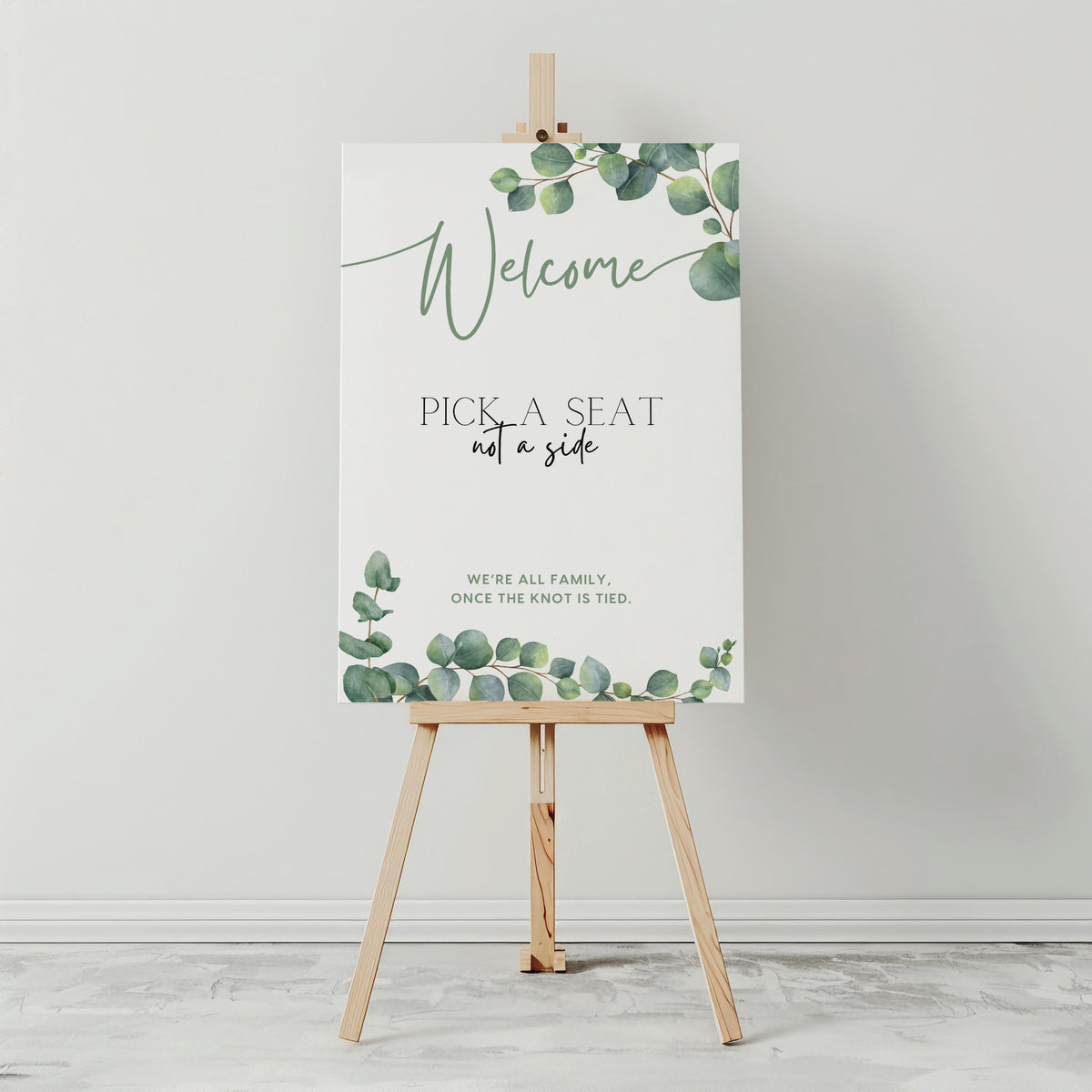 eucalyptus pick a seat not a side wedding ceremony sign - a personalised "pick  seat, not a side" wedding welcome sign, with a crisp white background and elegant green text, adorned with eucalyptus foliage