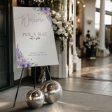 lilac lavender floral wedding pick a seat not a side sign - wedding ceremony sign, with a crisp white background and pretty lilac flowers, alongside elegant text