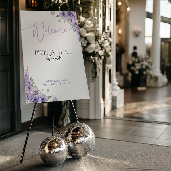 lilac lavender floral wedding pick a seat not a side sign - wedding ceremony sign, with a crisp white background and pretty lilac flowers, alongside elegant text