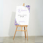 lilac lavender floral wedding pick a seat not a side sign - wedding ceremony sign, with a crisp white background and pretty lilac flowers, alongside elegant text