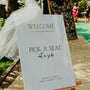 Minimalist wedding pick a seat, not a side ceremony sign - personalised wedding ceremony welcome sign, in a minimalist design, featuring a chic off-white plain background, and elegant and delicate typography