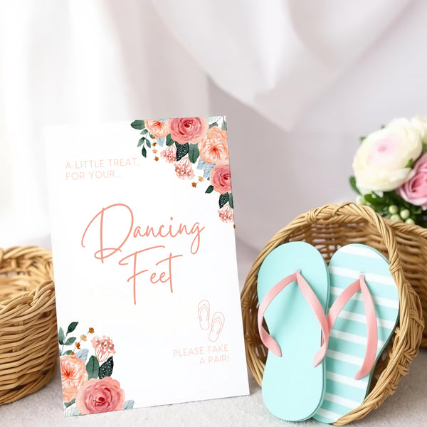 A stylish wedding sign reading "A little treat for your dancing feet, please take a pair", displayed next to a basket of flip-flops for guests. The design features elegant typography, perfect for a wedding reception.