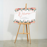 Peach and pink floral wedding welcome sign for a bright and happy wedding - personalised wedding board with custom names and date