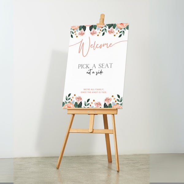 peach floral pick a seat not a side wedding ceremony sign - a personalised "pick seat, not a side" wedding welcome sign, with a crisp white background and elegant blush peach text, adorned with soft pastel peach floral blooms