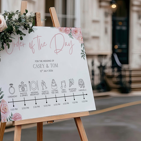 Pink roses design order of the day wedding sign - custom wedding board with elegant text and icons, displaying the order of events, featuring blush pink roses and an elegant header.