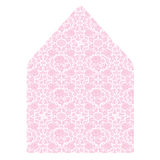 A flat lay of elegant wedding invitation envelopes, partially open to reveal beautifully designed envelope liners in various styles, including floral, modern, and classic patterns. The envelope inserts add a touch of luxury and sophistication to the stationery set.