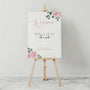 Pink Roses floral Pick a Seat Not a Side wedding ceremony sign - personalised wedding ceremony welcome sign, with a crisp white background, elegant blush pink typography, and adorned with sophisticated pink roses
