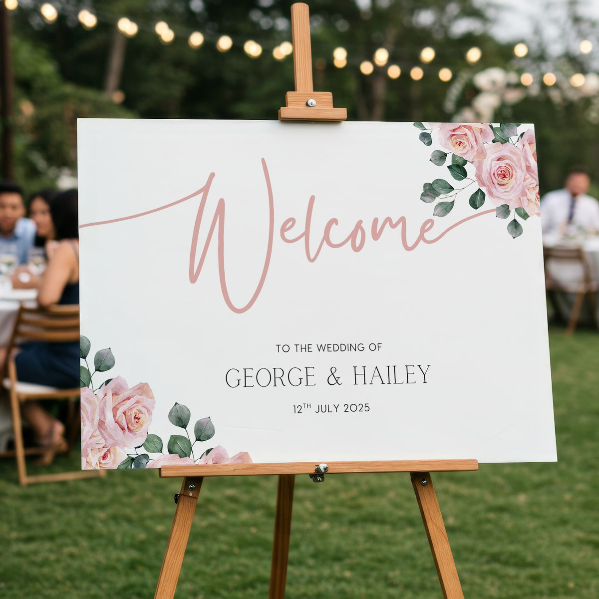 Pink Rose Floral wedding welcome sign in landscape orientation. A beautiful wedding welcome board, personalised with names and a date, adorned with pink roses and soft blush hues.