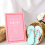 A stylish wedding sign reading "A little treat for your dancing feet, please take a pair", displayed next to a basket of flip-flops for guests. The design features elegant typography, perfect for a wedding reception.