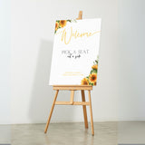 Sunflowers floral pick a seat not a side wedding ceremony sign - personalised pick a seat sign, with a crisp white background and an elegant yet joyful yellow typography, adorned with rustic and vibrant sunflowers.