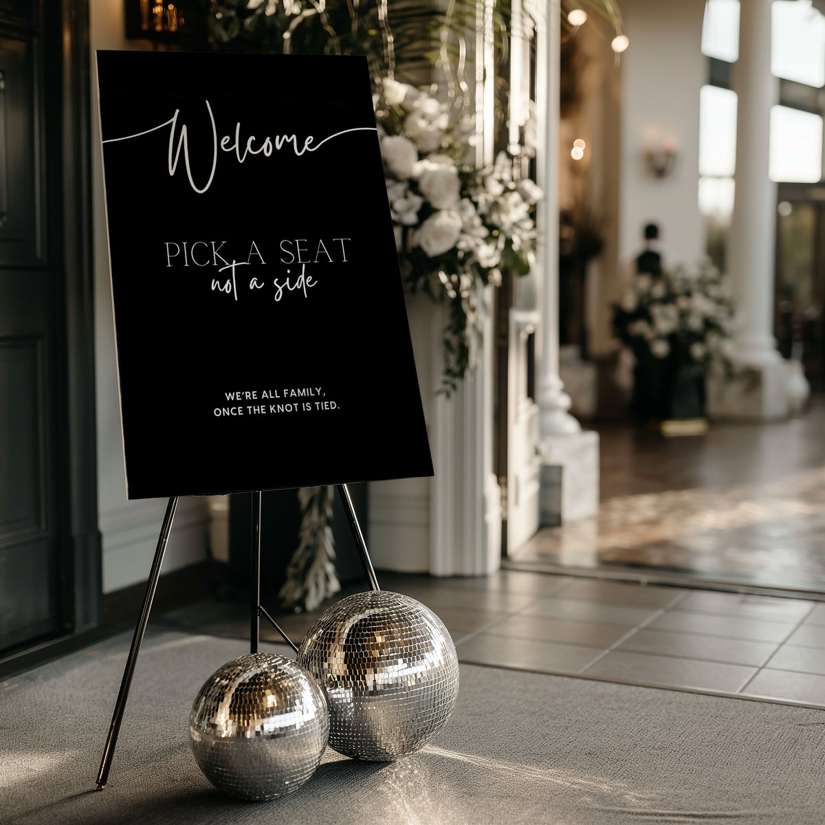 timeless black pick a seat not a side wedding welcome sign - personalised chic black wedding ceremony sign, featuring a bold black background, with elegant white typography, giving the ultimate classy-chic look.
