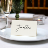 Personalised Wedding Place Cards – Elegant, custom wedding place cards with guest names, featuring a discreet QR code on the reverse for photo sharing.