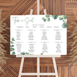 wedding seating plan sign featuring eucalyptus foliage