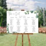 wedding seating plan sign featuring eucalyptus foliage