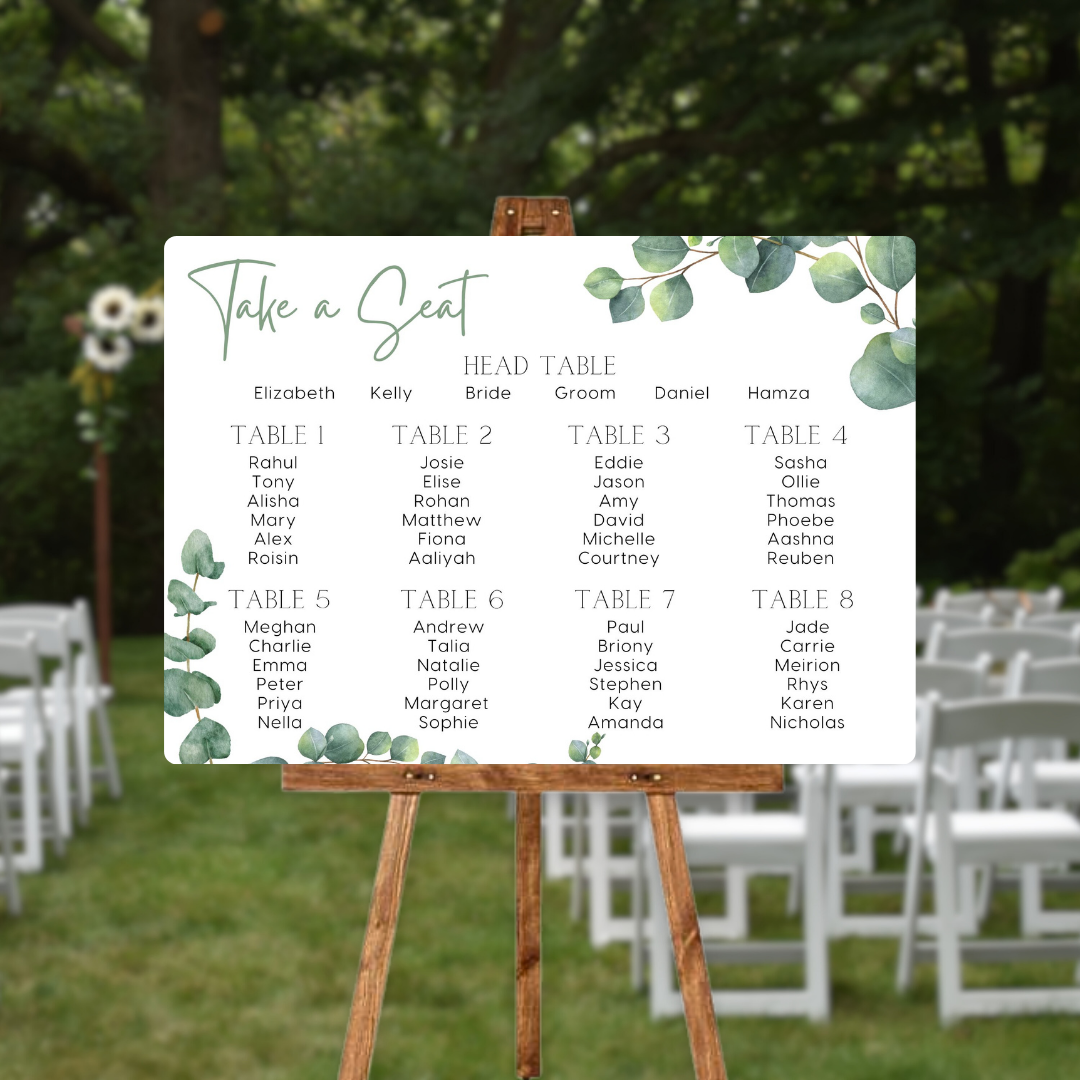 wedding seating plan sign featuring eucalyptus foliage