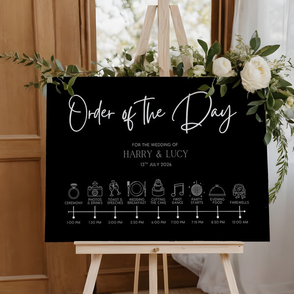 Black order of the day sign customised. A timeless and chic black wedding board, featuring crisp and sophisticated white text.