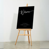 Black wedding welcome sign with custom details - a sleek black background with crisp white text, for a modern and sophisticated welcome to your special day