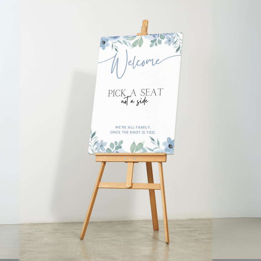 blue floral pick a seat not a side wedding ceremony sign - a personalised "pick  seat, not a side" wedding welcome sign, with a crisp white background and elegant dusty blue text, adorned with soft blue floral blooms