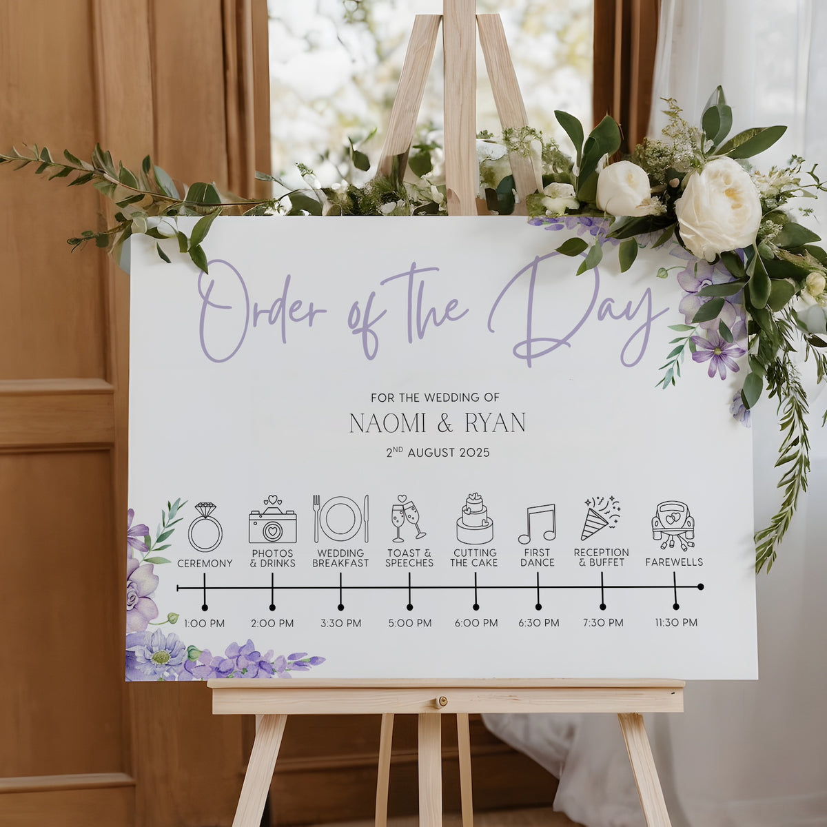 lilac floral order of the day board for weddings - a personalised order of events sign, with a crisp white background and sophisticated black text, adorned with lilac and lavender florals.