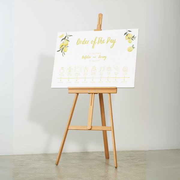 Limoncello wedding order of the day sign with lemon watercolour illustrations and yellow script text