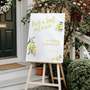 Limoncello pick a seat not a side wedding sign with lemon watercolour illustrations and yellow script text