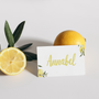 Limoncello wedding place card with lemon watercolour illustrations and playful handwritten script