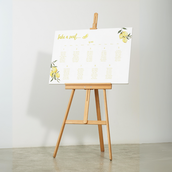 Limoncello wedding seating plan sign with lemon watercolour illustrations and yellow script text