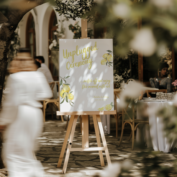 Limoncello unplugged ceremony wedding sign with lemon watercolour illustrations and yellow script text