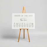 Minimalist off-white wedding order of the day board - a crisp white background, featuring elegant black text and sophisticated icos, giving an overall clean and minimalist aesthetic