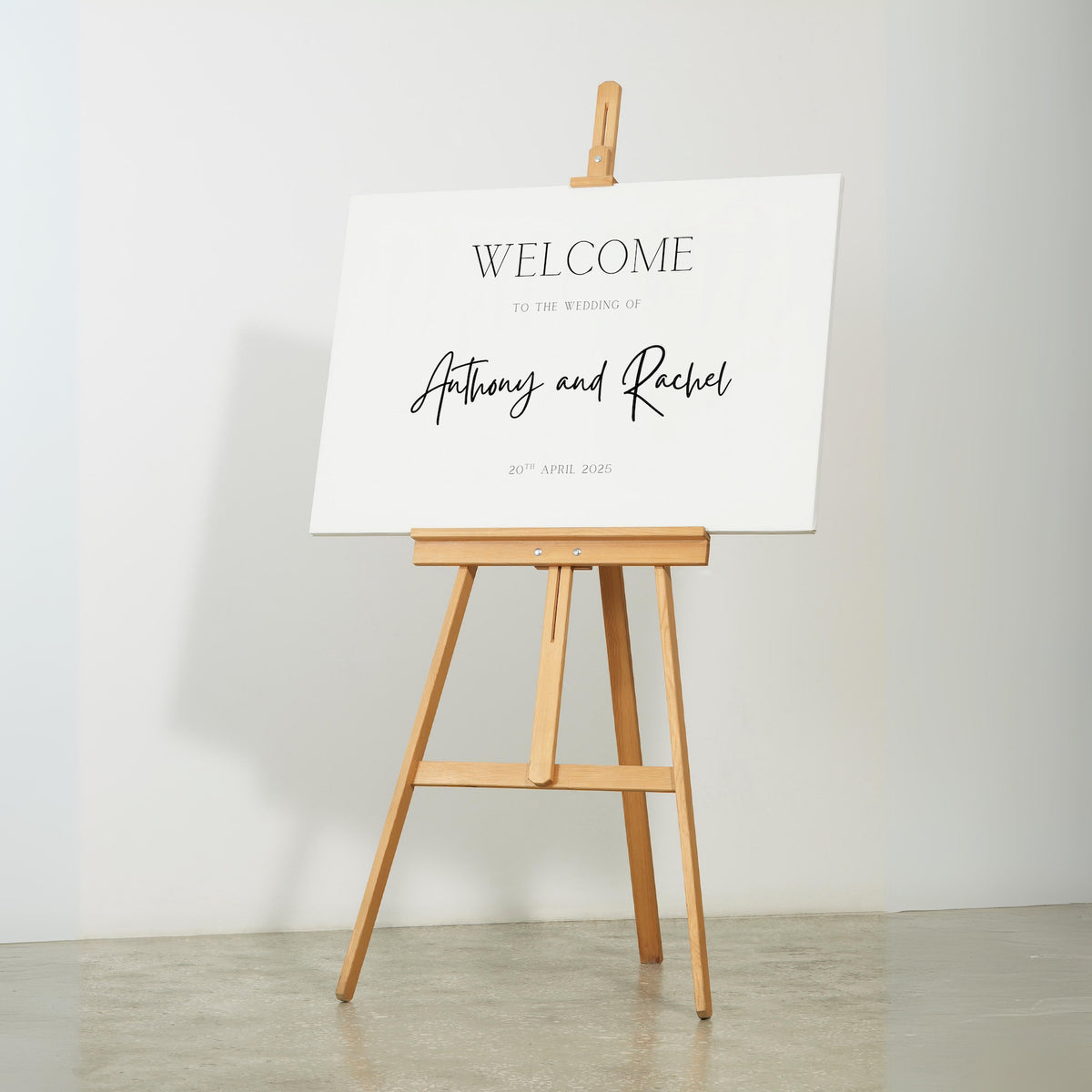 minimalist wedding welcome sign - personalised wedding welcome board, with off-white background and crisp black text