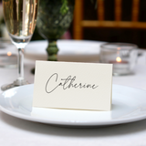 Personalised Wedding Place Cards – Elegant, custom wedding place cards with guest names, featuring a discreet QR code on the reverse for photo sharing.