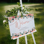 Peach and pink floral wedding welcome sign for a bright and happy wedding - personalised wedding board with custom names and date
