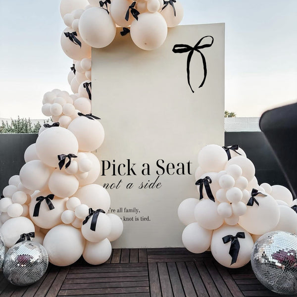 Pick a seat not a side wedding ceremony sign old money aesthetic - wedding welcome sign in timeless design with black bow detail.