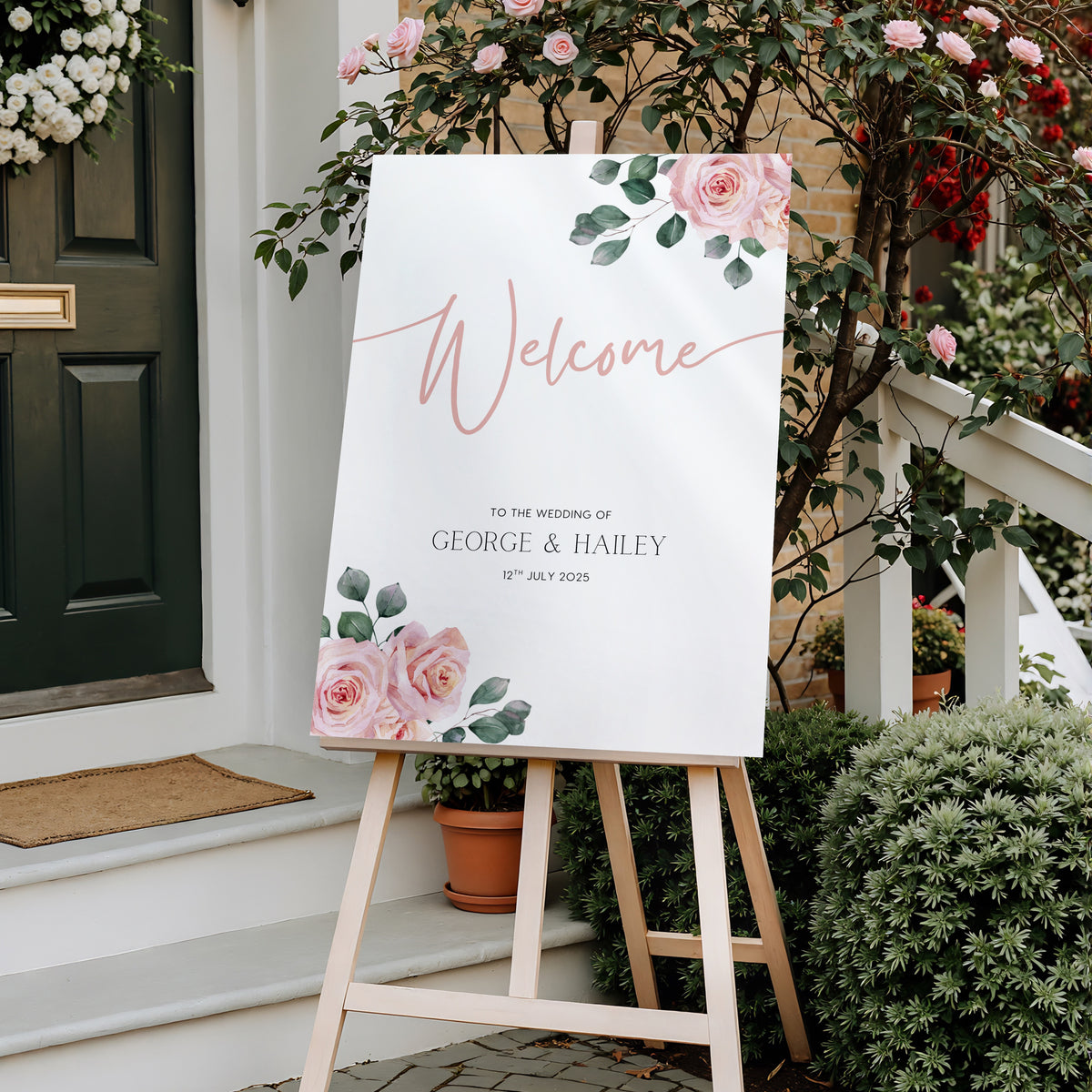 Pink Rose Floral wedding welcome sign in portrait orientation. A beautiful wedding welcome board, personalised with names and a date, adorned with pink roses and soft blush hues.