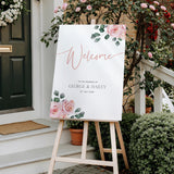 Pink Rose Floral wedding welcome sign in portrait orientation. A beautiful wedding welcome board, personalised with names and a date, adorned with pink roses and soft blush hues.