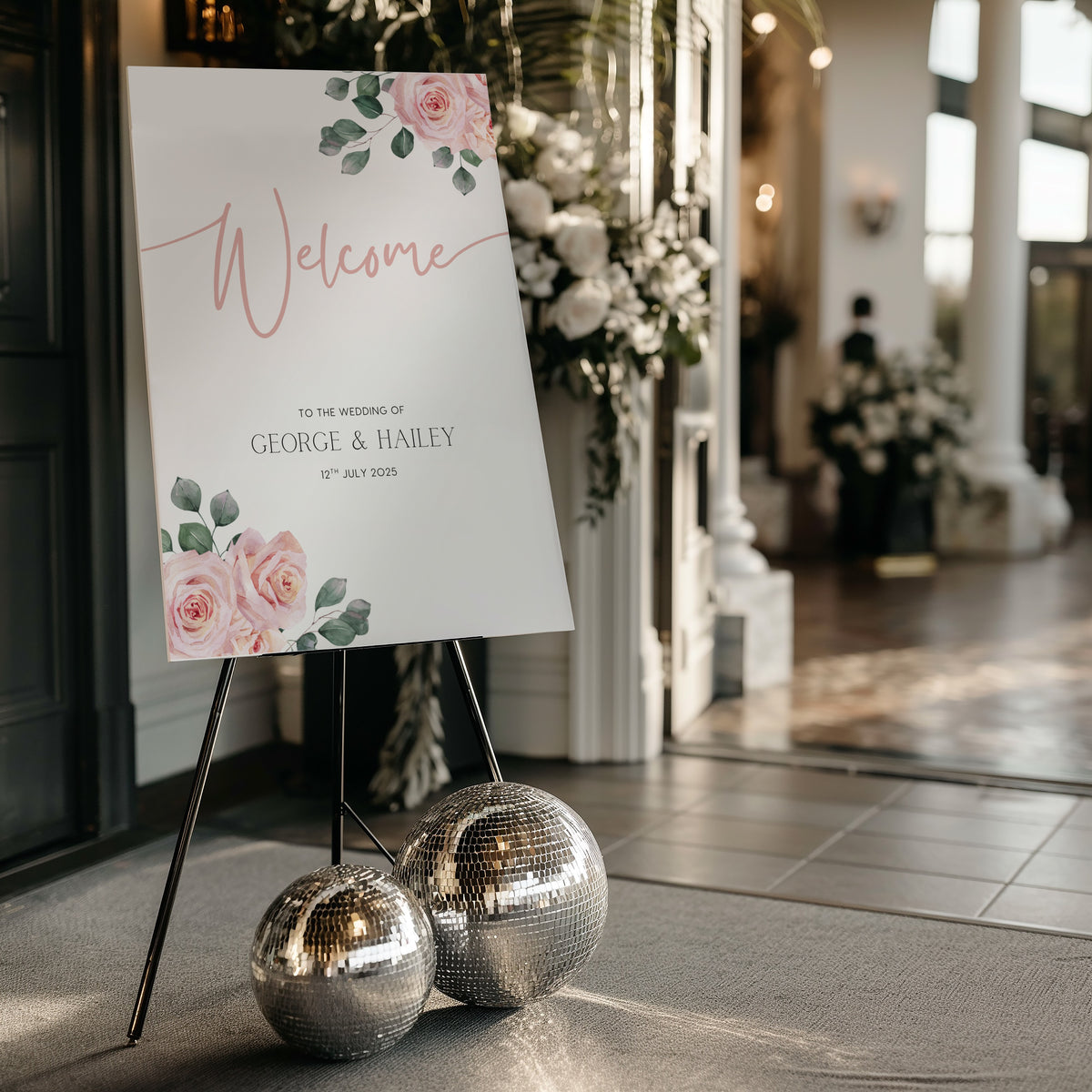 Pink Rose Floral wedding welcome sign in portrait orientation. A beautiful wedding welcome board, personalised with names and a date, adorned with pink roses and soft blush hues.