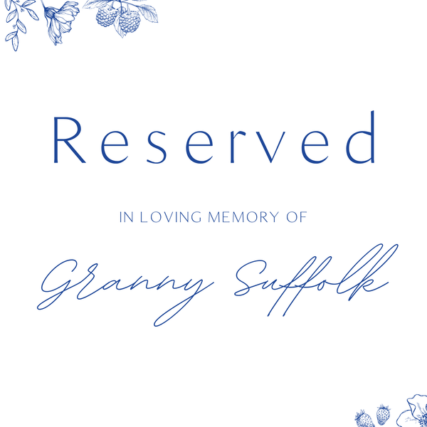 Santorini reserved in memory wedding chair sign with blue botanical sketches and elegant handwritten script