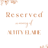 Sienna floral reserved in memory wedding chair sign with terracotta botanical sketches and elegant boho typography