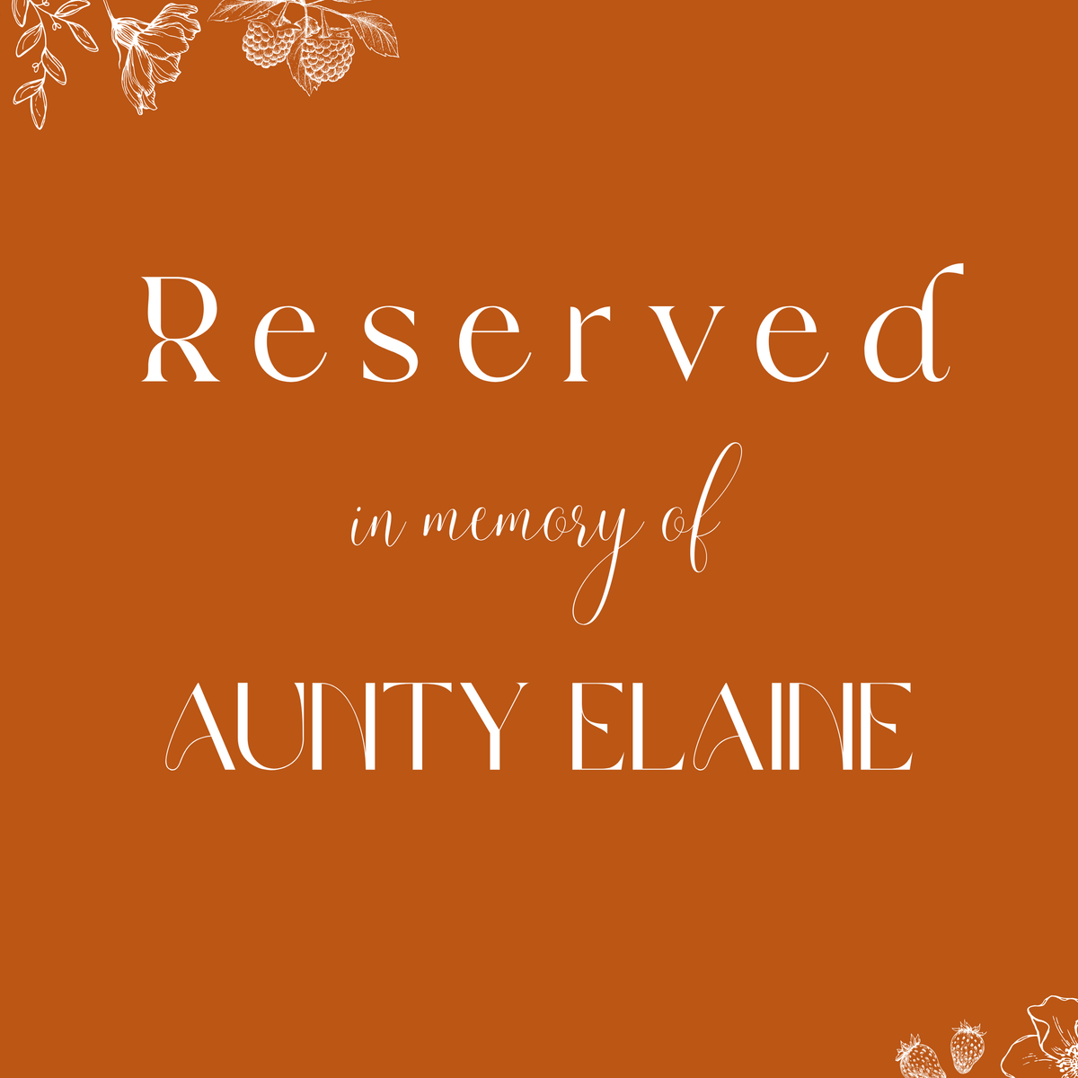 Toasted Amber reserved in memory wedding chair sign with burnt orange background and white botanical line art