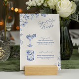 Santorini signature drinks wedding sign with blue botanical sketches and elegant handwritten script