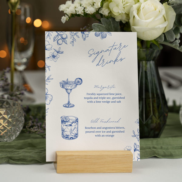 Santorini signature drinks wedding sign with blue botanical sketches and elegant handwritten script