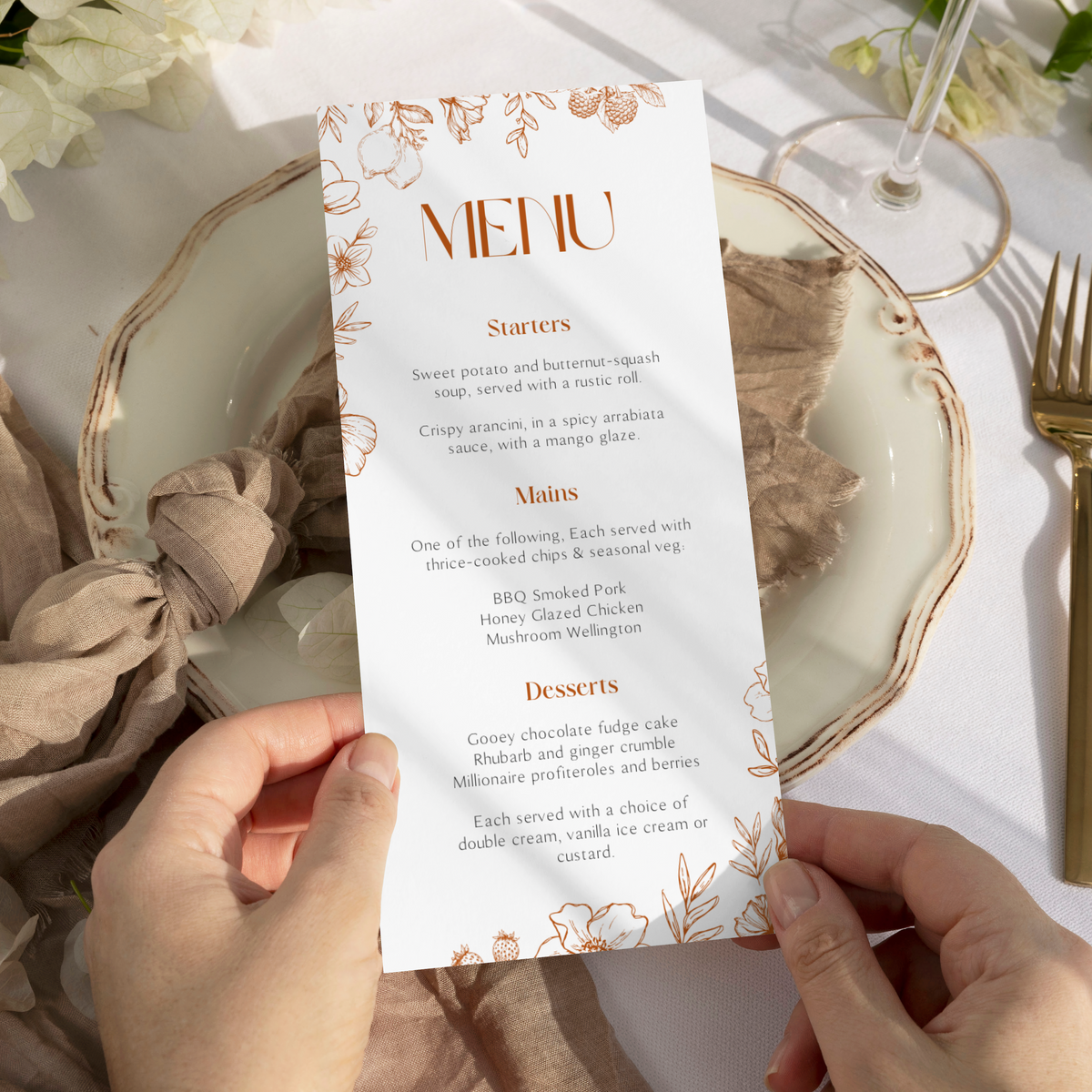 Sienna floral wedding menu card with terracotta botanical sketches and elegant boho typography