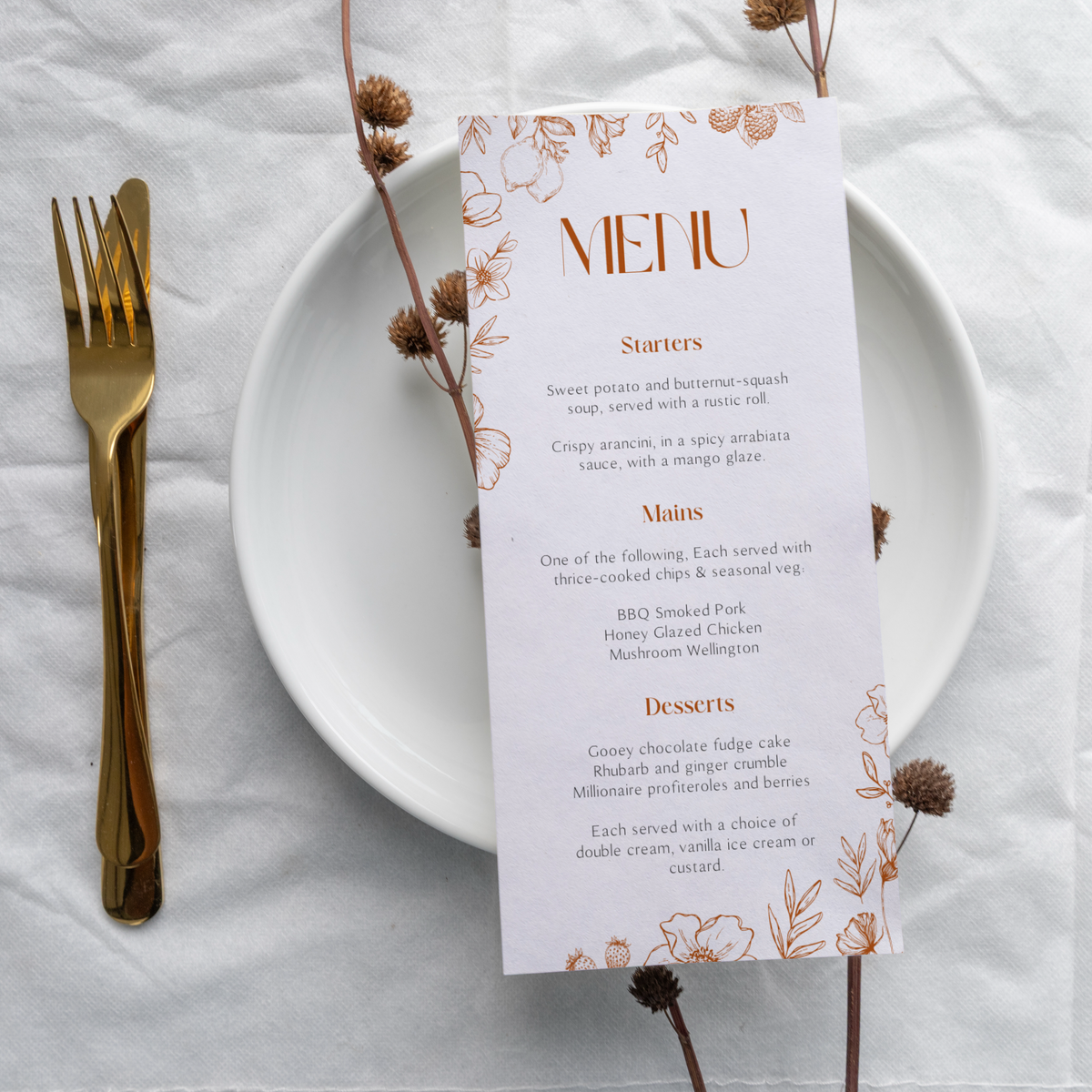 Sienna floral wedding menu card with terracotta botanical sketches and elegant boho typography