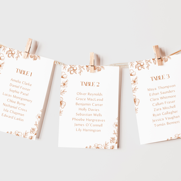 Sienna floral wedding seating plan cards with terracotta botanical sketches and elegant boho typography