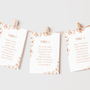 Sienna floral wedding seating plan cards with terracotta botanical sketches and elegant boho typography