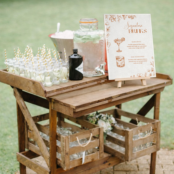 Sienna floral signature drinks wedding sign with terracotta botanical sketches and elegant boho typography