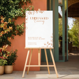 Sienna floral unplugged ceremony wedding sign with terracotta botanical sketches and elegant boho typography
